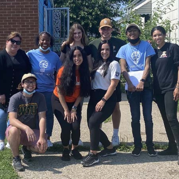 Group of SciPol-Detroit members posing together outside