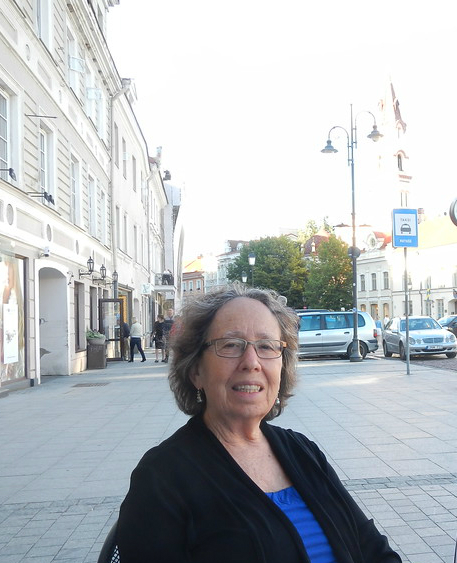 Professor Margaret Winters standing in the street.