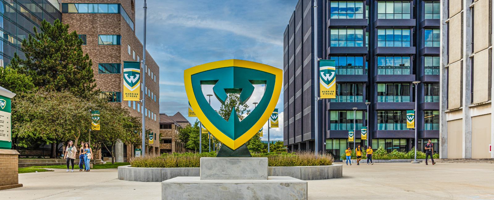 A sculpture of the WSU shield logo on campus