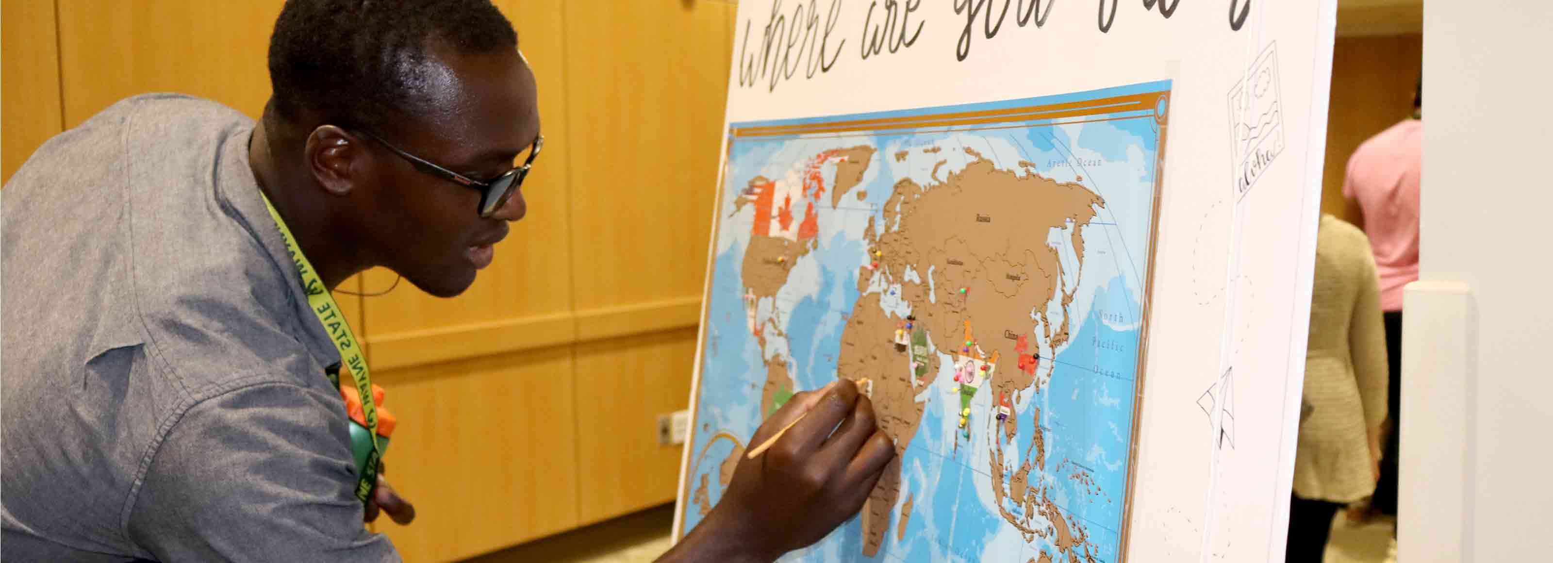 Student drawing on map